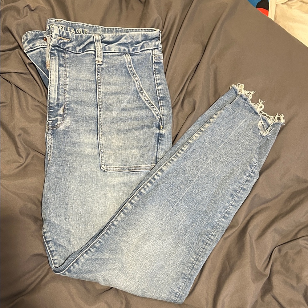 American Eagle Curvy Super High Rise Light Blue Ankle Jegging with Frayed Hem